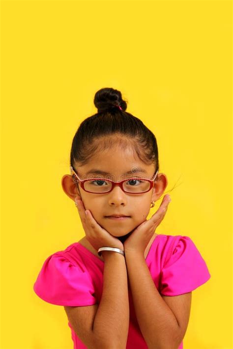 4 Year Old Brunette Latina Girl With Eyeglasses Dressed In Leotard And Ballerina Tutu Takes