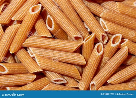Uncooked Whole Grain Penne Rigate Pasta Background Stock Image Image