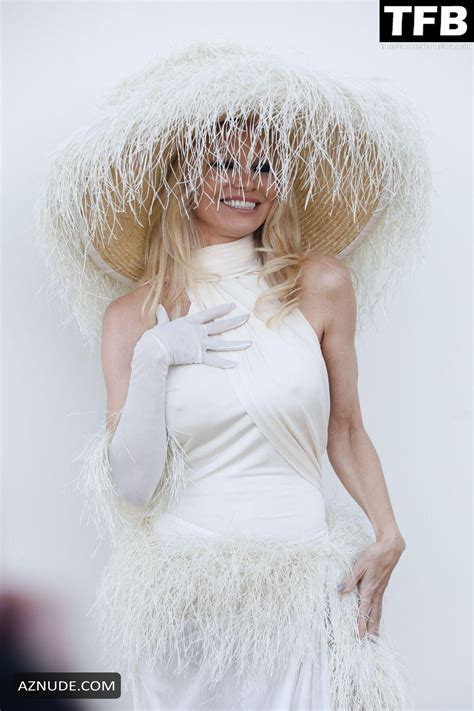 Pamela Anderson Sexy Flaunts Her Hot Boobs At The Le Raphia Jacquemus Show In Le Bourget AZNude