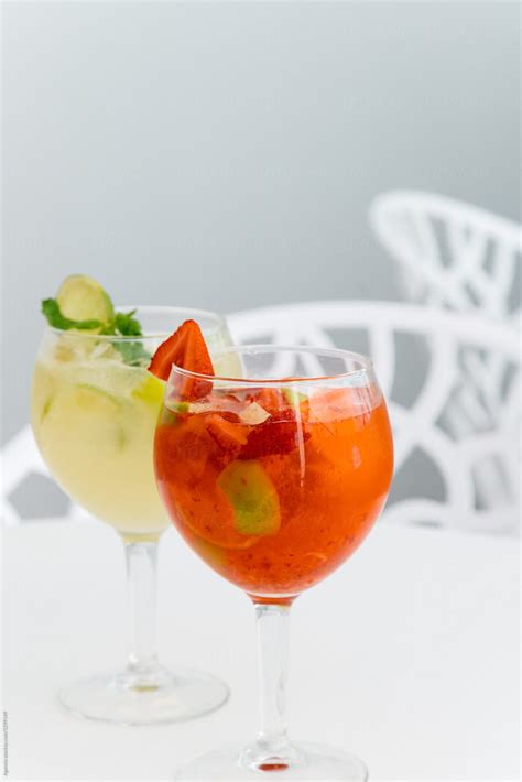 "Two Cocktails On A Terrace Table." by Stocksy Contributor "Agencia