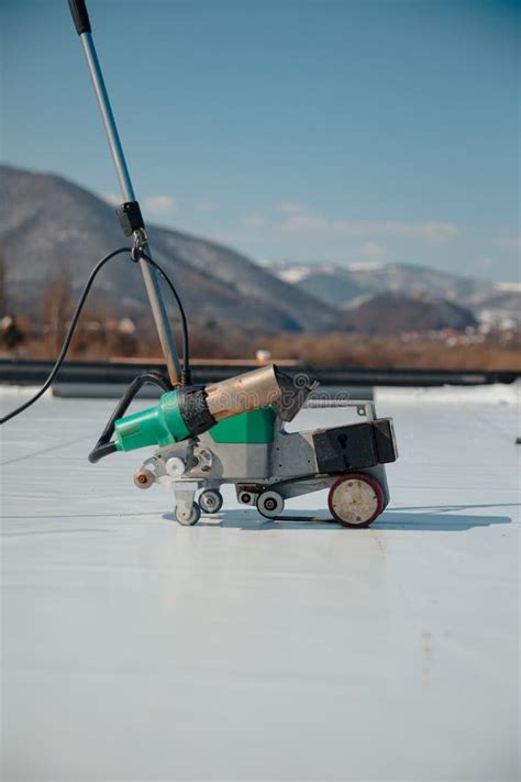 Automatic Welder Hot Air Tools Welds Synthetic Membranes On Roof Stock Photo Image Of Laborer