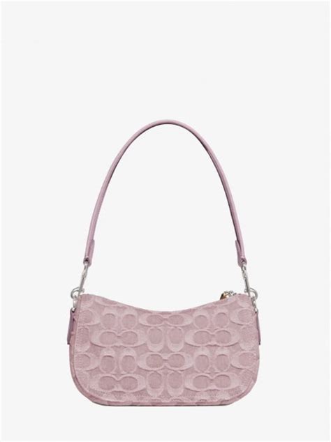 Оригинальные сумки бренда Coach в Москве
