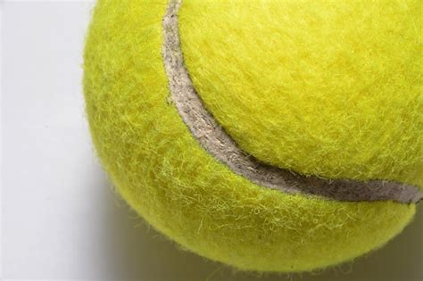 Premium Photo | Close-up of tennis ball over white background