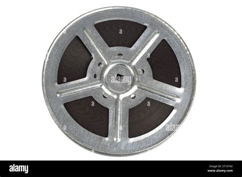 Vintage 16mm Film Reel And Cine Film On White Background Isolated On