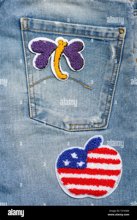 Applying Fabric Patches To Denim Stock Photo Alamy