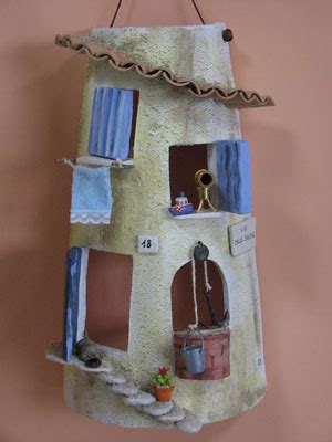 Cannella e Melograno: Tegole decorate/ Decorated tiles