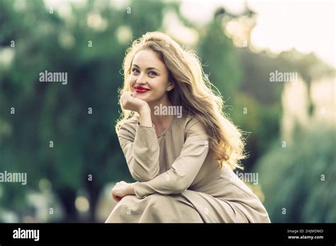 Woman Long Blonde Hair Squatting Hi Res Stock Photography And Images Alamy