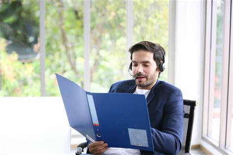premium photo handsome technical support operator working  computer