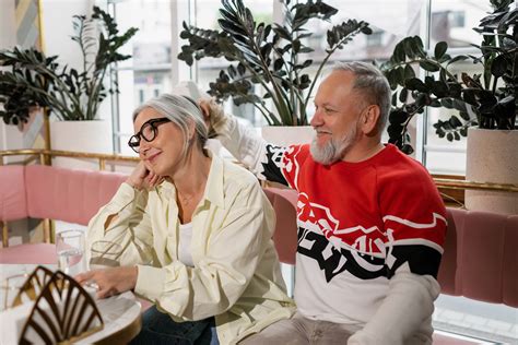 Elderly Couple Sitting Beside Each Other · Free Stock Photo