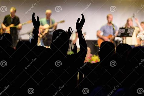 Christians Raising Their Hands In Praise And Worship Stock Image