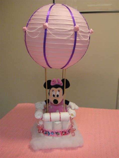 A Minnie Mouse Cake With A Hot Air Balloon On Top