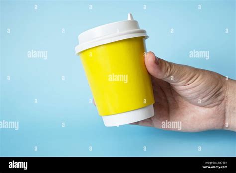 Paper Cup Of Coffee In Man S Hand Paper Cup For Hot Drink Idea For