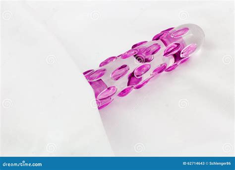 Sex Toy Glass With Pink Knobs In Bed Stock Image Image Of Knobs Sensuality 62714643