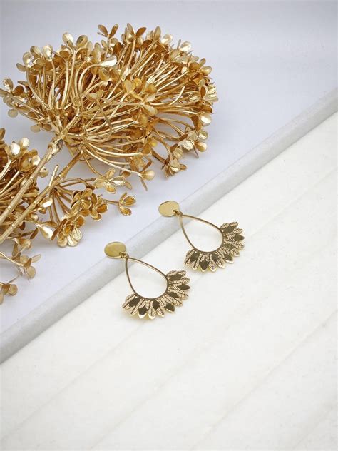 Boucles Originales Plumes Beli Et Jolie Dor Es Livraison Rapide Pas