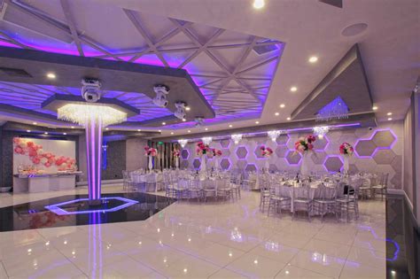 A Large Banquet Hall With Tables And Chairs