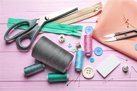 Premium Photo Set Of Tailoring Tools Accessories And Fabric On Table