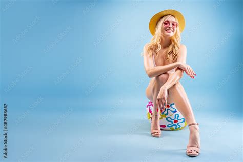 Fashion Glamour Portrait Of Pretty Beautiful Woman In Summer Bikini Posing On Blue Background