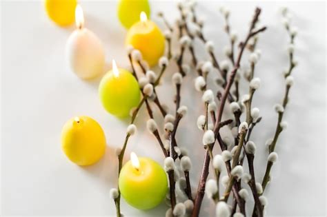 Premium Photo Pussy Willow Branches And Easter Egg Candles