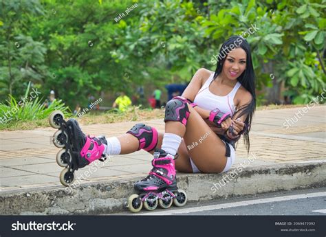 Latina Woman Sitting Smiling On Roller Stock Photo Shutterstock