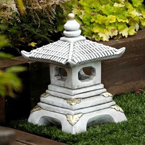 ABOUT OUR PRODUCT GARDEN PAGODA 56 Lb Stone Garden Statue Is Made Of