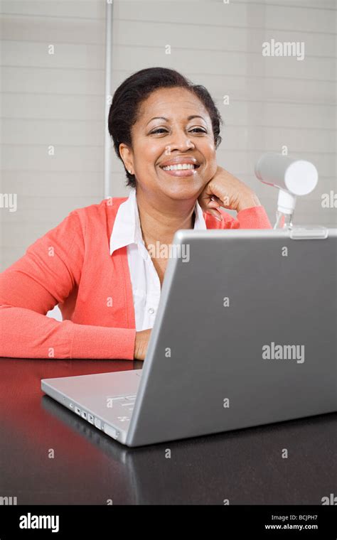 Mature Woman Using Webcam Photo Stock Alamy