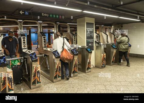 New York Ny June 8 2020 Subway Commuters Enter And Exit Station On