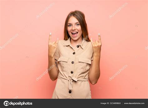 Lithuanian Blonde Girl Isolated Pink Background Making Rock Gesture Stock Photo By Luismolinero