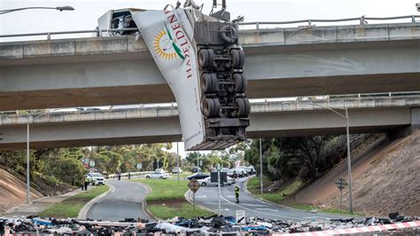 Melbourne Traffic Truck Crash Calder Freeway Hanging Off Bridge