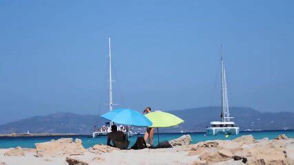 Happy Naked Sunbathers In Spain