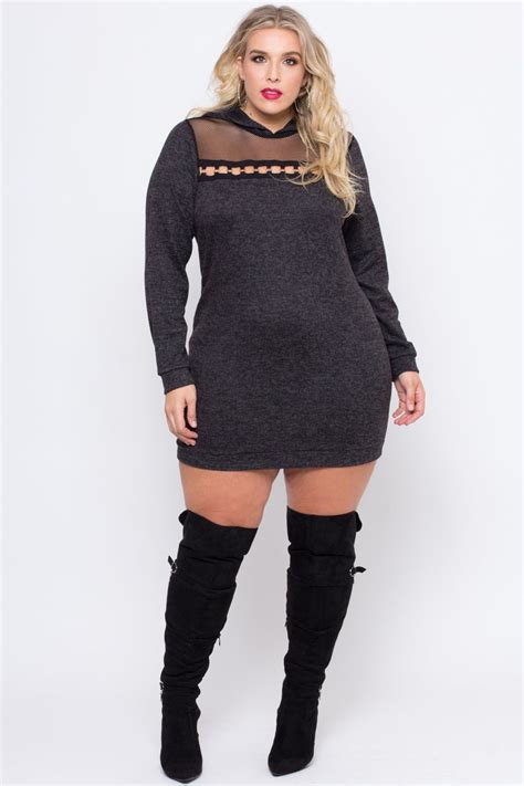 This Plus Size Stretch Knit Sweater Dress Features A Round Neckline