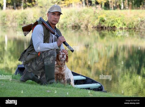 Hunter With Dog Stock Photo Alamy
