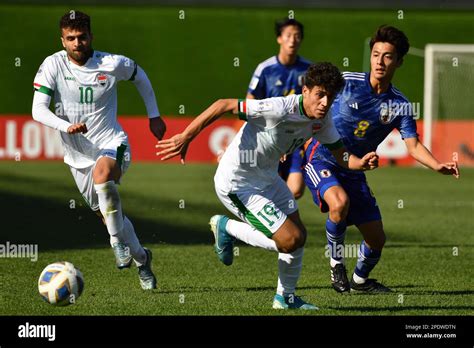 Iraq S Sajjad Mohammed Al Saedi Centre Fights For The Ball WithJapan