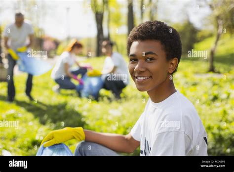 Gay Male Volunteer Polishing Nature Stock Photo Alamy