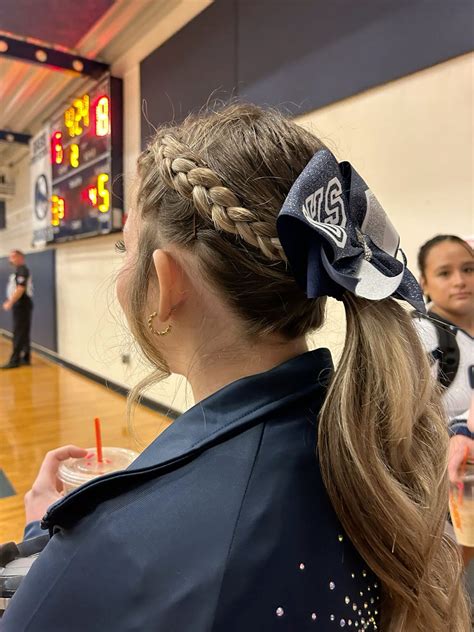 Trendy Cheerleading Hairstyles for Competitions and Games 12