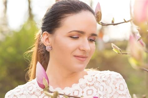 Premium Photo Closeup Portrait Of Amazing Brunette Model With Nude Makeup Posing Near The