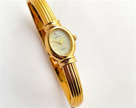 Very Rare 1990s Gold Plated Lassale Seiko Articulated Bangle Quartz Watch With Mother Of Pearl