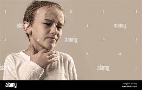 Child Has A Sore Throats Young Boy Feels That His Throat Is Pain Ill