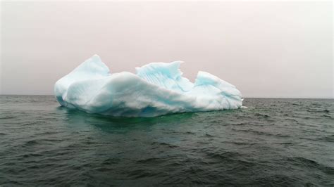 Aerial Travelling Shot Of Blue Iceberg Stock Footage Sbv