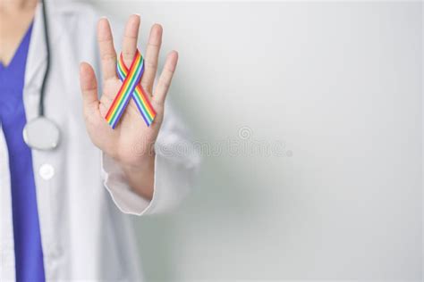 Doctor With Lgbtq Rainbow Ribbon For Support Lesbian Gay Bisexual Transgender And Community