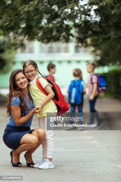 mom sending kids  school stock  high res pictures