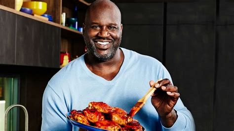 Shaq Holding Things