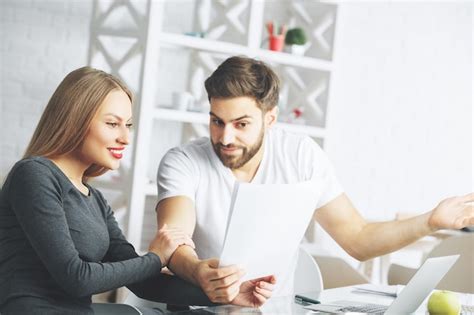 premium photo cheerful businesspeople  paperwork