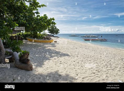 An Idyllic White Sand Beach Of Pamilacan Island In The Philippines With