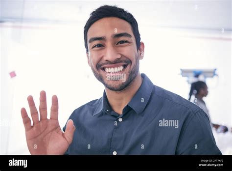 I Cant Wait To Work With You A Mature Businessman Waving At Work Stock Photo Alamy