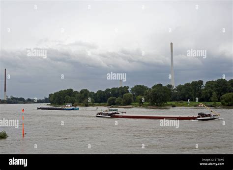 Commercial Barges Sailing On The River Rhine Leverkusen Germany Stock