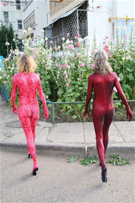 Two Horny Red Zentai Wearing Chick Exposing XXX Dessert Picture