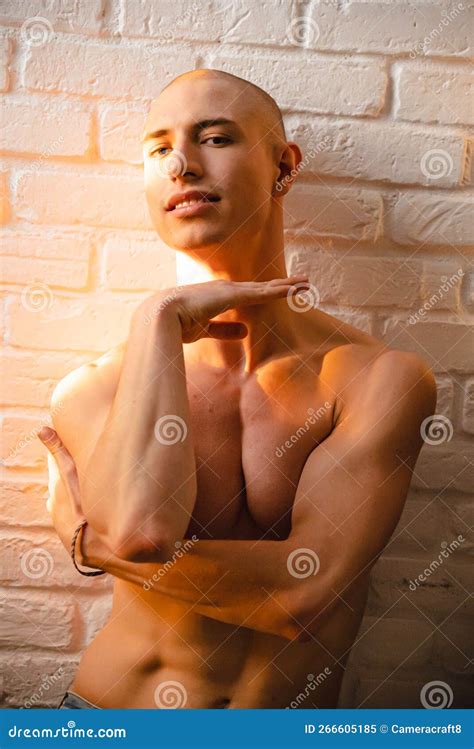 Portrait Of Bald Man Model With Naked Muscular Torso Stock Image