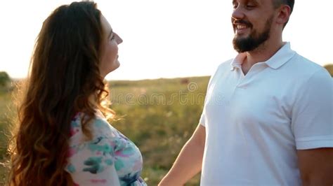 Pregnant White Woman With Blonde Hair Wearing Cardigan Over Underwear