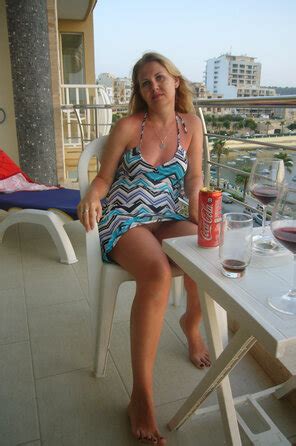 Pulling Her Bra Aside Porn Pic