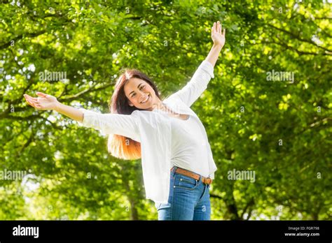 Beautiful Brunette In The Park Stock Photo Alamy